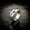 vitelpharma’s Sleeping Beauty Mountain Ring on a reflective black background. The ring is stood up.