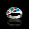 vitelpharma’s Sleeping Beauty Mountain Ring on a black background, made from sterling silver with a turquoise centre. ocean red coral arrow tips with intricate stamping along the band