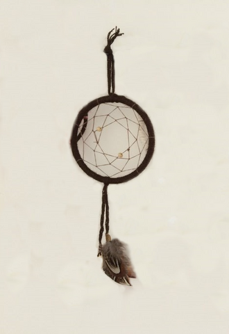 A 7 point dream catcher in brown with feathers, representing The Seven prophecies of the Grandfathers Wisdom, love, respect, bravery, honesty, humility, truth.